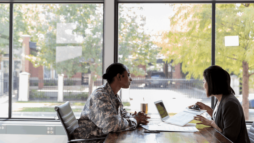 Veteran reviewing medical documentation with tax professional
