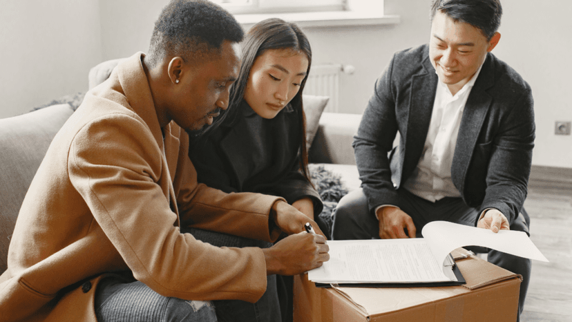 Couple reviewing final property tax bill adjustment with their agent