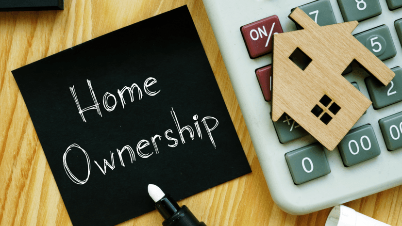 Calculating long term homeownership costs with a wooden house figure