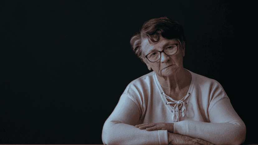 Elderly woman longing for his late veteran husband