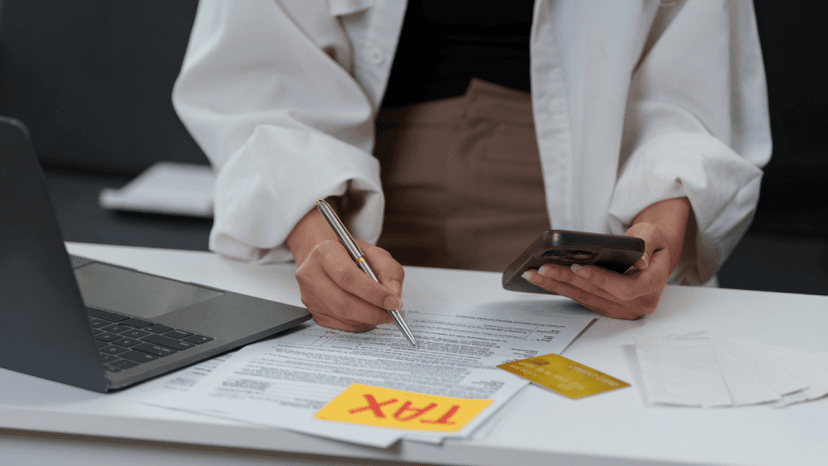 Tax professional managing client’s tax documents to avoid losing property