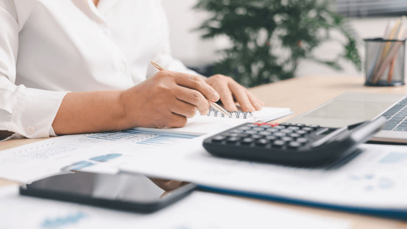 Consultant calculating percentage adjustments for property tax comparable valuations