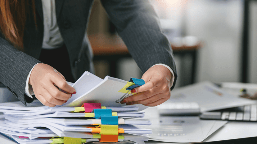 Consultant reviewing property documents to weigh appeal value