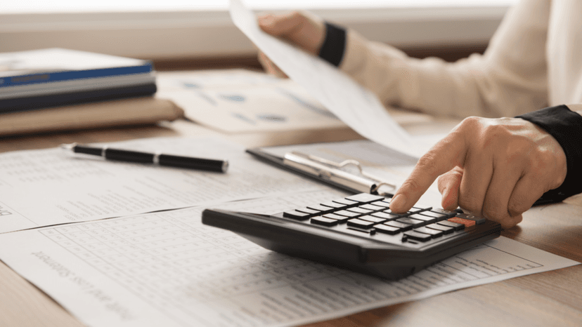 Individual cross-checking tax records and calculations for a billing error