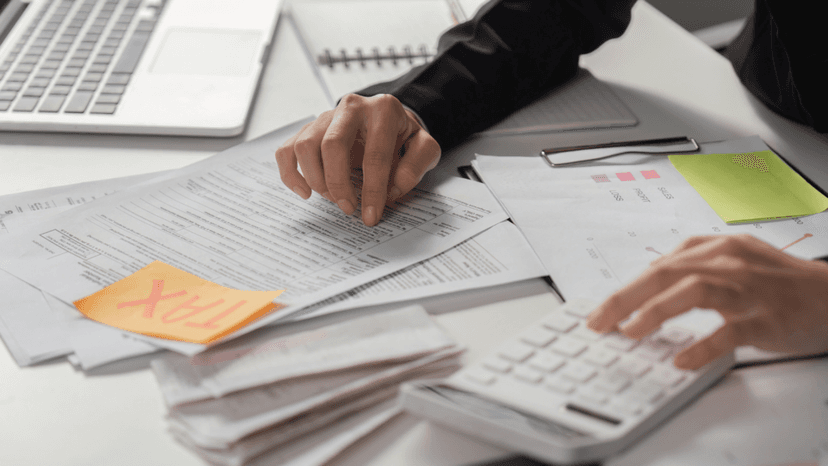 Property owner cross checking tax paperwork against assessment details