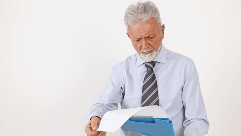 Senior reviewing required documents for Texas property tax exemption filing