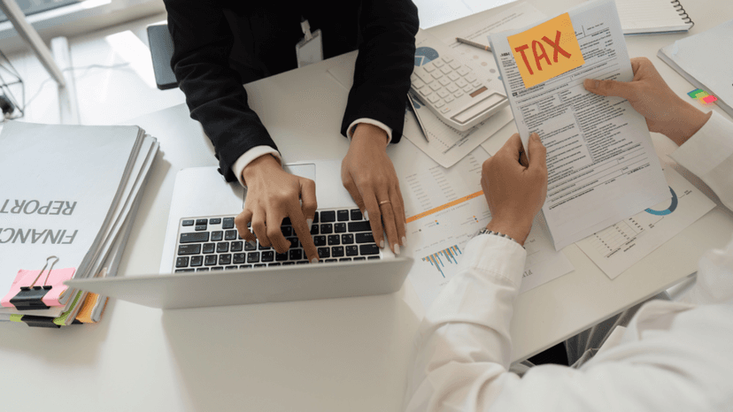 Tax consultant pointing out details on a property assessment form