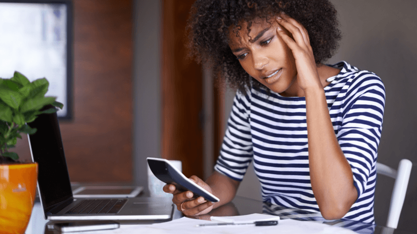Woman stressed over unsuccessful property tax protest while checking documents