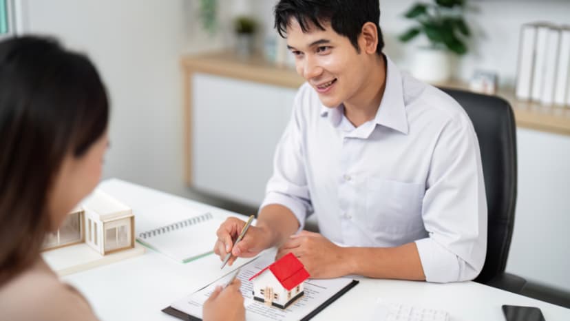 Consultant explaining a property valuation to a homeowner
