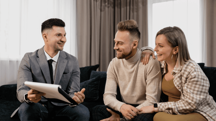 Consultant reviewing appeal documents with homeowners seeking professional representation