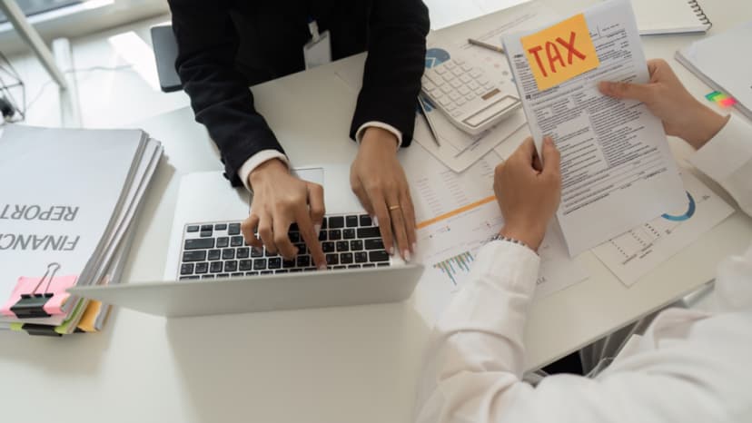 Consultant reviewing tax documents with homeowner during appeal discussion