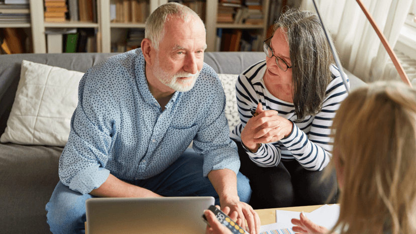 Homeowners discussing exemption eligibility with a family member